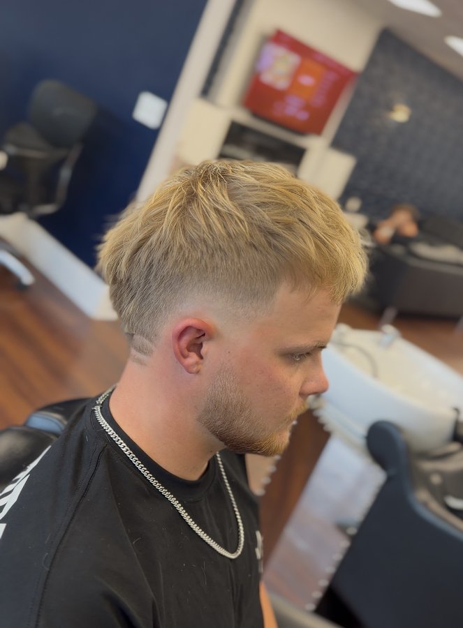 Blonde taper fade with hair design
